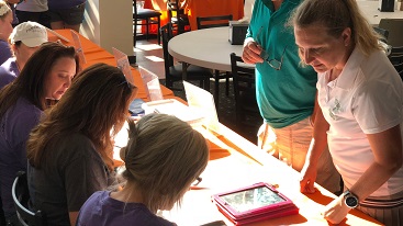 CAC Golf Tournament registration table